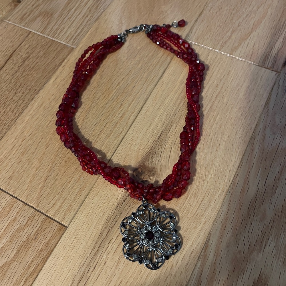 Silver colored medallion red beaded multi strand necklace adjustable length